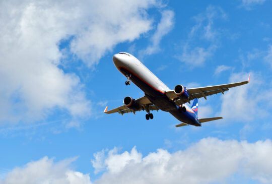 Travel by plane. The concept of flying by an airplane.